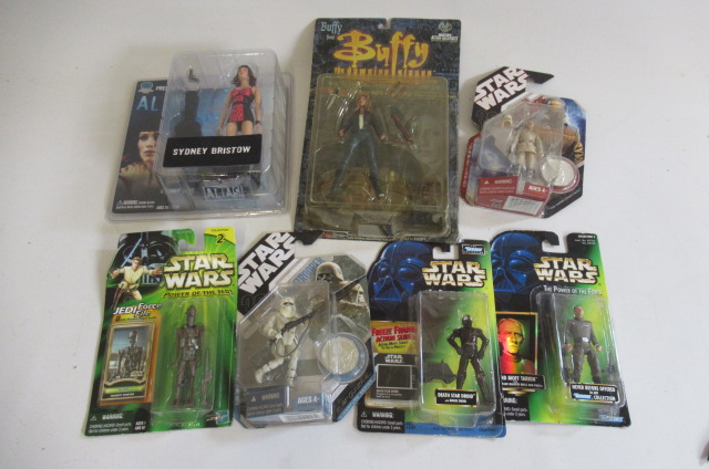 Action figures by Hasbro and others including Buffy Image
