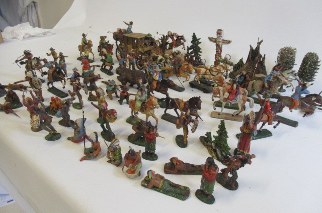 A large quantity of Elastolin North American cowboys and indians including stage coach Image