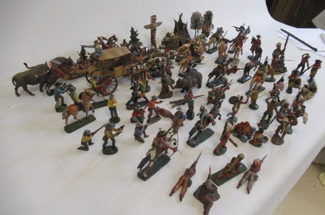 A large quantity of Elastolin North American cowboys and indians including stage coach Image