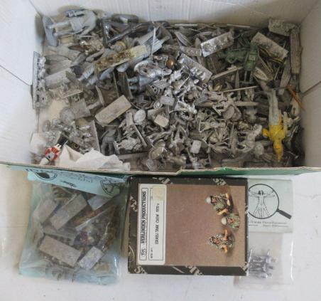 Unpainted late issue white metal figures in various scales Image