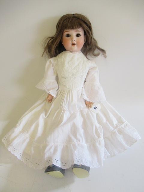 A Schoenau & Hoffmeister bisque socket head doll Image