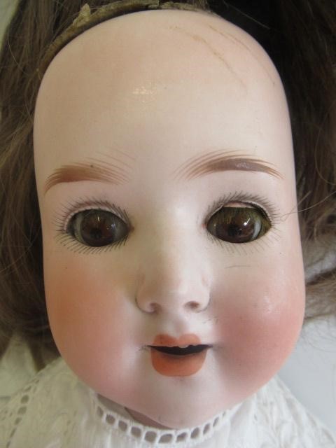 A Schoenau & Hoffmeister bisque socket head doll Image