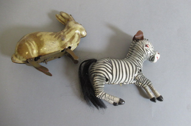 Chinese clockwork zebra and UK made clockwork hare Image