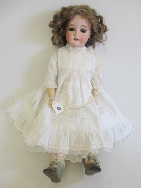 A Schoenau & Hoffmeister bisque socket head doll Image