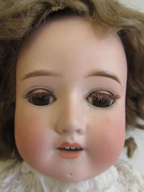 A Schoenau & Hoffmeister bisque socket head doll Image