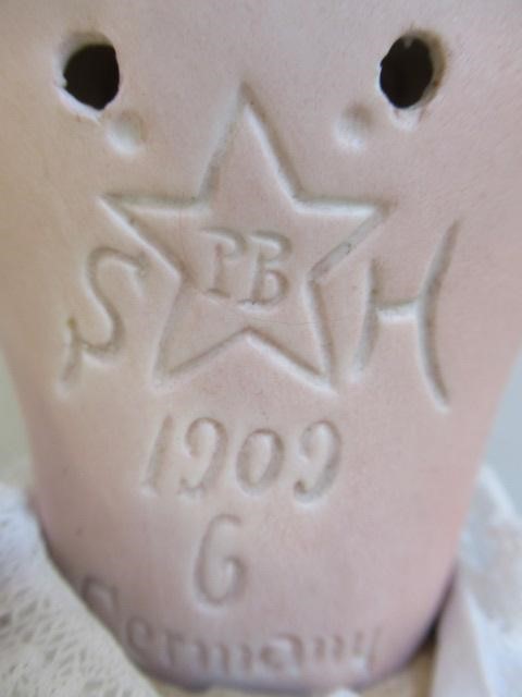 A Schoenau & Hoffmeister bisque socket head doll Image