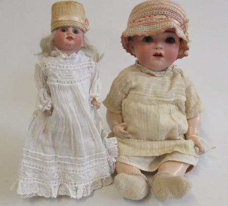 Two bisque socket head dolls, comprising a Franz Schmidt & Co. girl Image