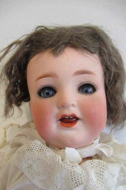 A Heubach Koppelsdorf bisque socket head character doll Image