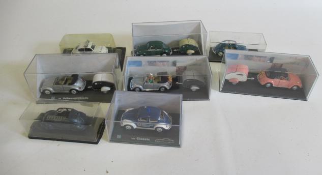 1:48 scale diecast models of the V.W. Beetle including Police and caravan models Image