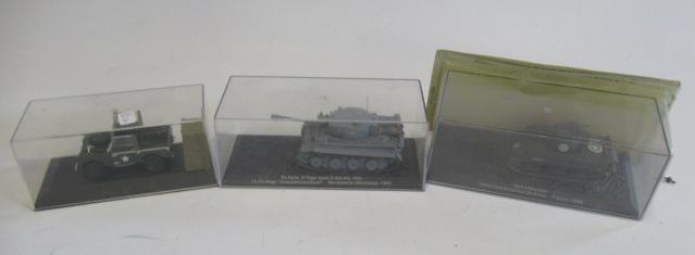 Three military vehicles comprising German Tiger tank Image