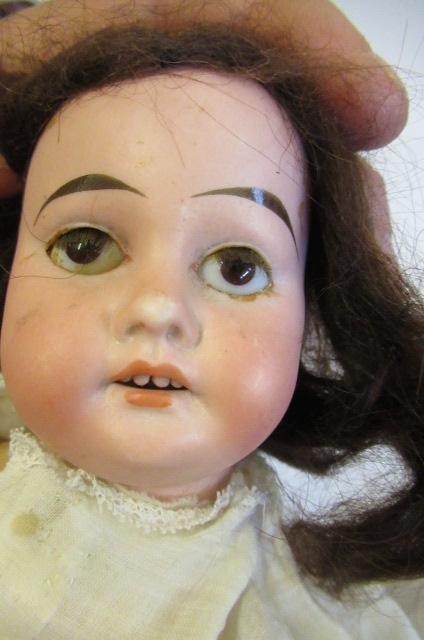An Armand Marseille bisque socket head doll Image