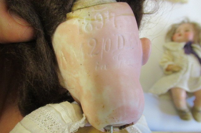 An Armand Marseille bisque socket head doll Image