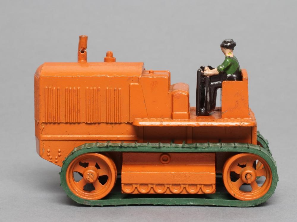 Moko Lesney mechanical tractor finished in orange with green tracks Image