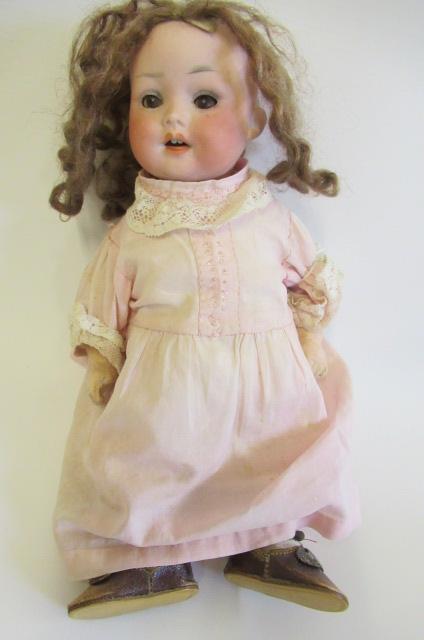 A Porzellamfabrik Mengersgereuth bisque socket head doll Image