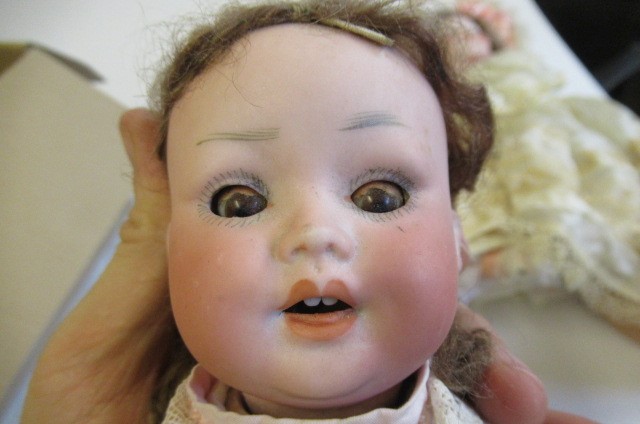 A Porzellamfabrik Mengersgereuth bisque socket head doll Image
