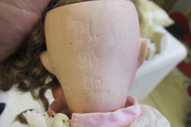 A Porzellamfabrik Mengersgereuth bisque socket head doll Image