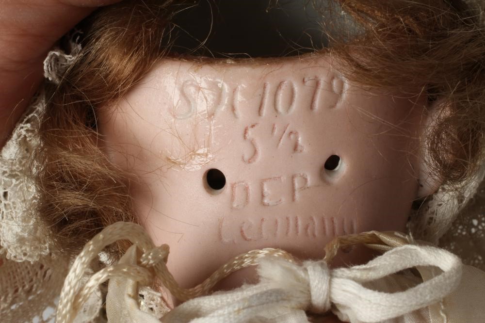 A Simon Halbig bisque socket head doll Image