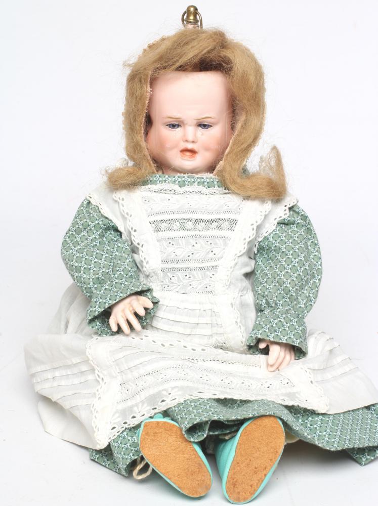 A Carl Bergner three faced bisque head doll Image