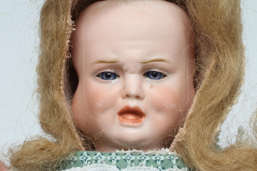 A Carl Bergner three faced bisque head doll Image