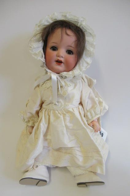 An Armand Marseille Koppelsdorf bisque socket head character doll Image