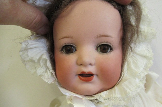 An Armand Marseille Koppelsdorf bisque socket head character doll Image