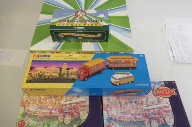 Four Corgi Fairground models comprising E.R.F. Showman wagon Image