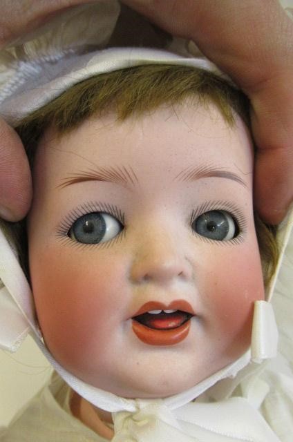 A Heubach Koppelsdorf bisque socket head character doll Image