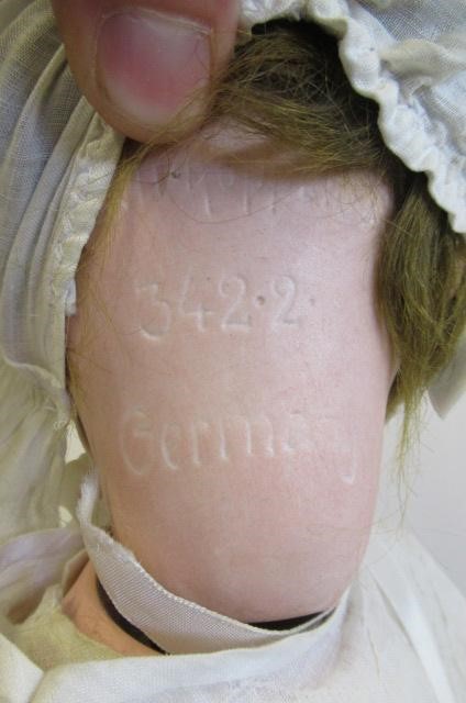 A Heubach Koppelsdorf bisque socket head character doll Image