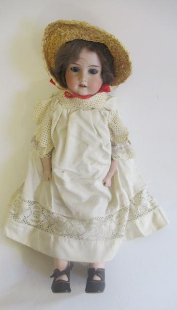 An Armand Marseille bisque shoulder head doll Image