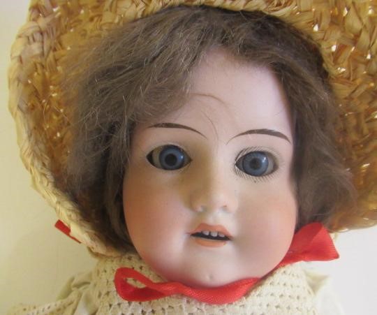 An Armand Marseille bisque shoulder head doll Image