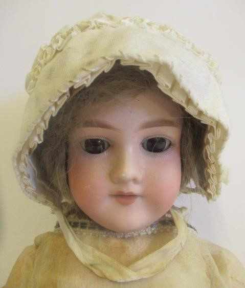 An Armand Marseille bisque socket head doll Image