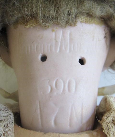 An Armand Marseille bisque socket head doll Image