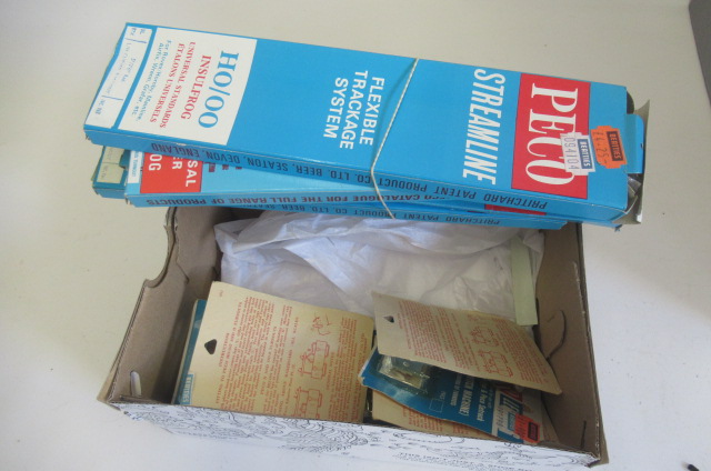 Four Peco streamline points and six Peco point motors Image