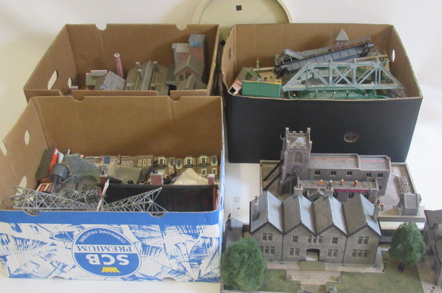 A large quantity of line side buildings and station accessories including low-relief housing Image