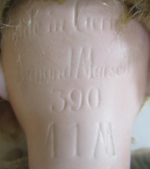 An Armand Marseille bisque socket head doll Image