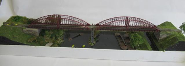 OO gauge model railways layout with large bridge section and terminal station Image