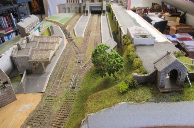OO gauge model railways layout with large bridge section and terminal station Image