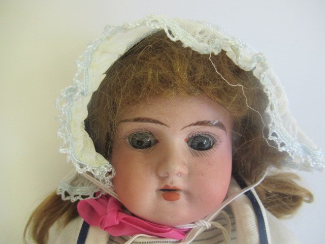 Two bisque shoulder head dolls Image