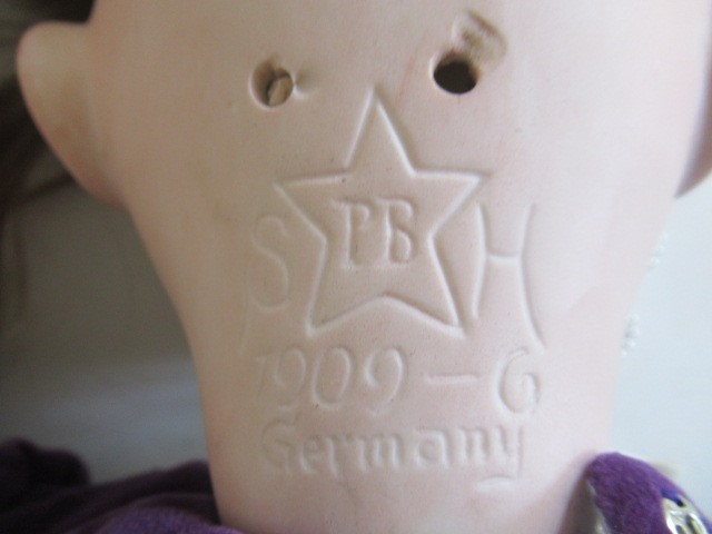 A Simon & Halbig bisque socket head doll Image