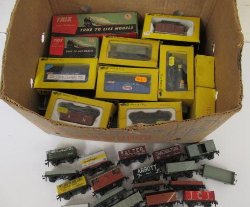 Trix plastic goods rolling stock comprising thirty six boxed goods wagons and twenty unboxed goods Image