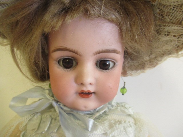 A Simon & Halbig bisque socket head doll Image