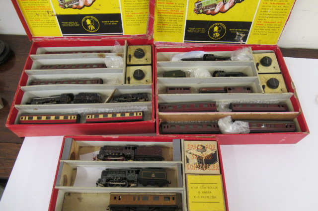 Playworn Trix Twin locomotives and rolling stock in train set boxes Image