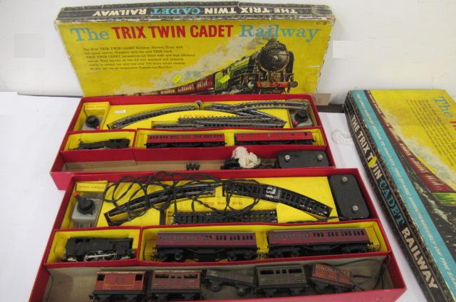 Two Trix Cadet Railway train sets with plastic locomotive and rolling stock Image