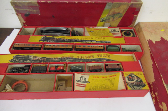 Two Trix Twin train sets comprising passenger set with L.N.E.R. locomotive and coaches and goods set Image