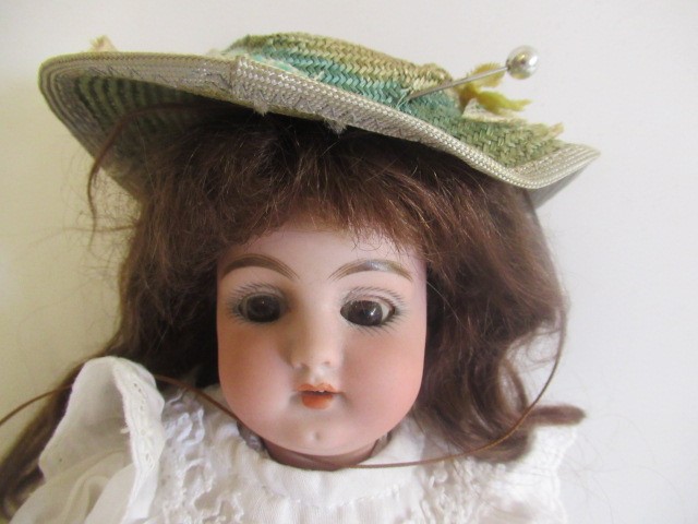 A Simon & Halbig bisque socket head doll Image