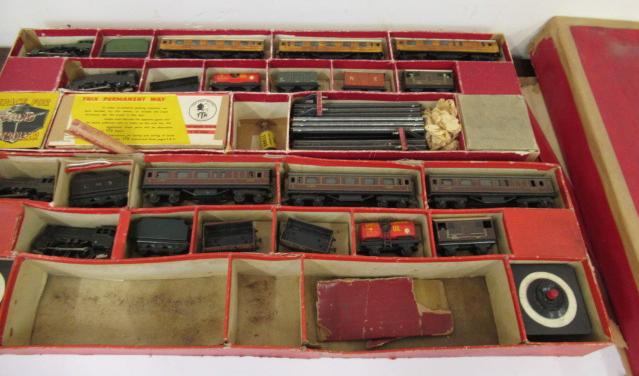 Two Trix Twin train sets comprising passenger set with L.M.S. locomotive and goods set with L.M.S. Image