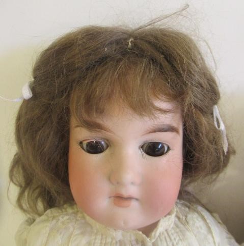 Two Armand Marseille bisque head dolls Image