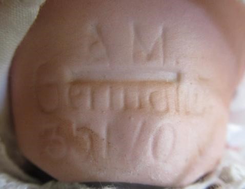 Two Armand Marseille bisque head dolls Image