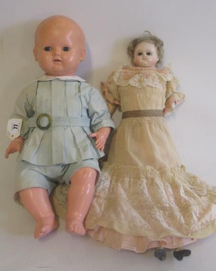 An antique composition shoulder head doll Image