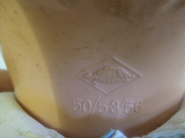 An antique composition shoulder head doll Image